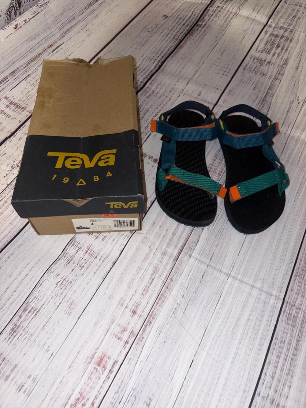 New, never wore Kids Teva Teal, Blue & Orange Sandals Size 3